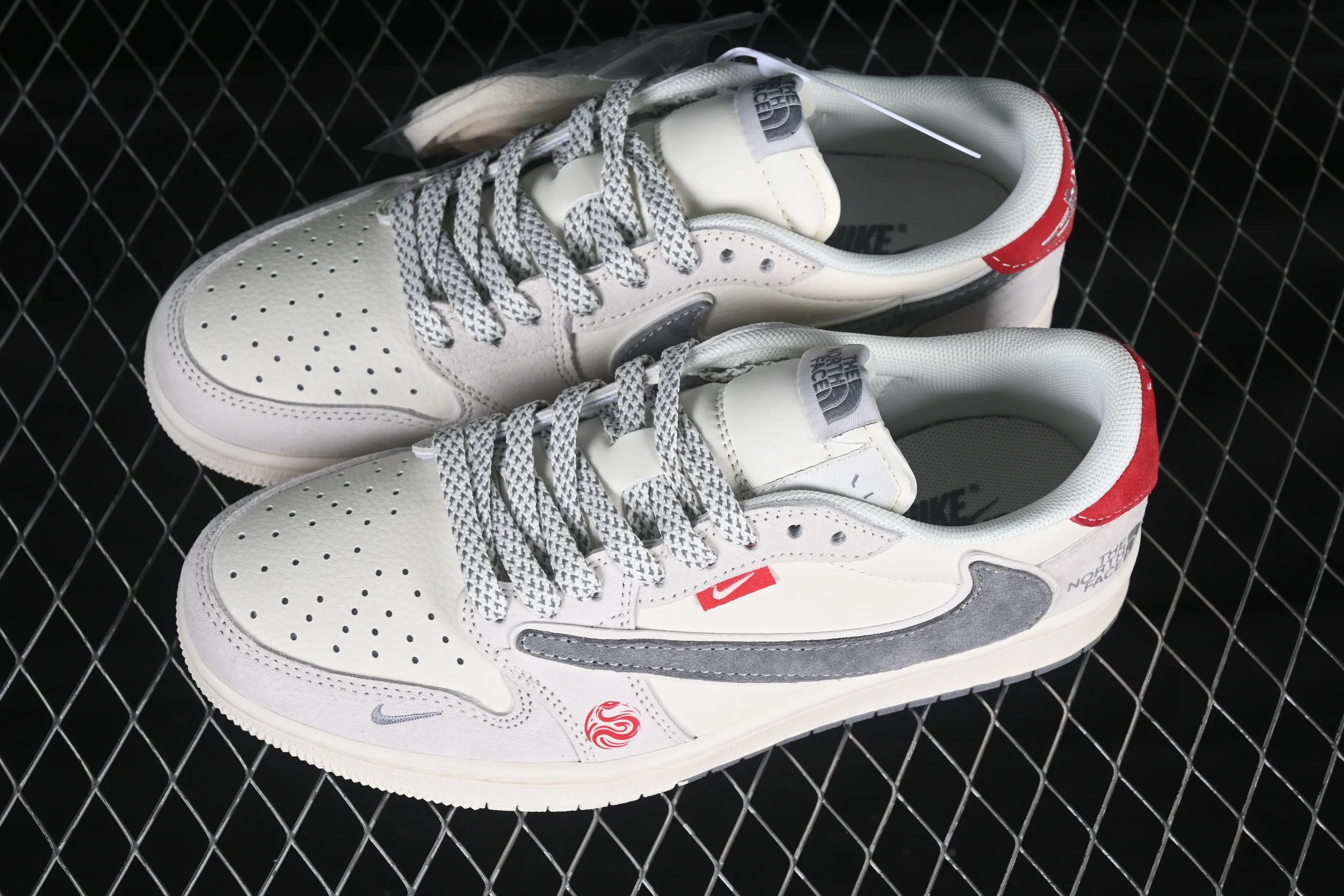 All categories Air Jordan Jordan series basketball shoes Air Jordan 1 Low high-end customized low-top sneakers Travis Scott x Fragment Design x Air Jordan 1 Low OG SP AJ1 Joe 1 North Face joint brand Year of the Snake limited pair beige low-top cultural casual sneakers SJ2068-145